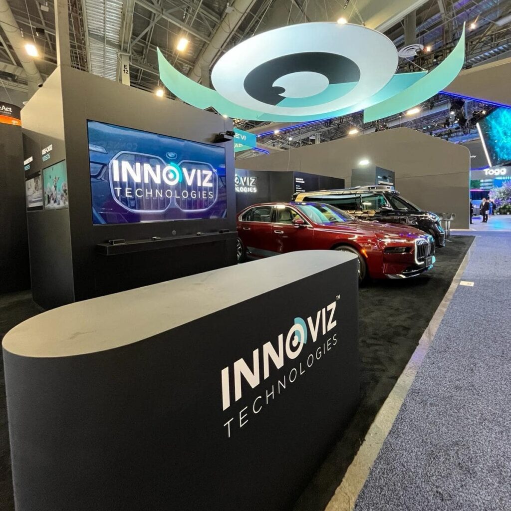 3D fabricated letters and logos on a custom booth — EC Exhibits